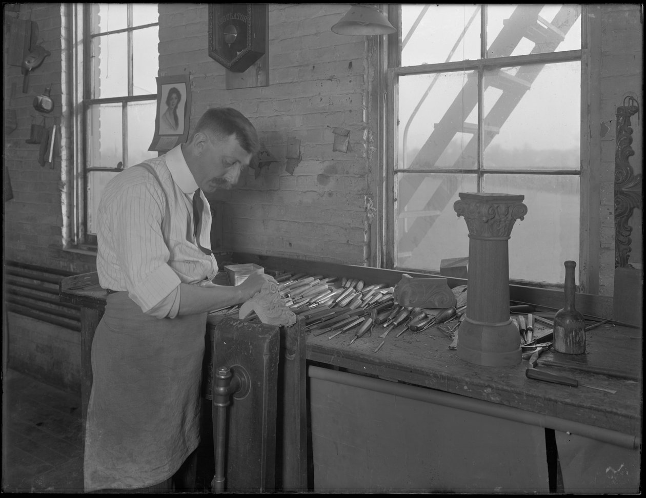 Carver working on casket ornaments, Oneida, New York, April 3, 1916 by William Davis Hassler