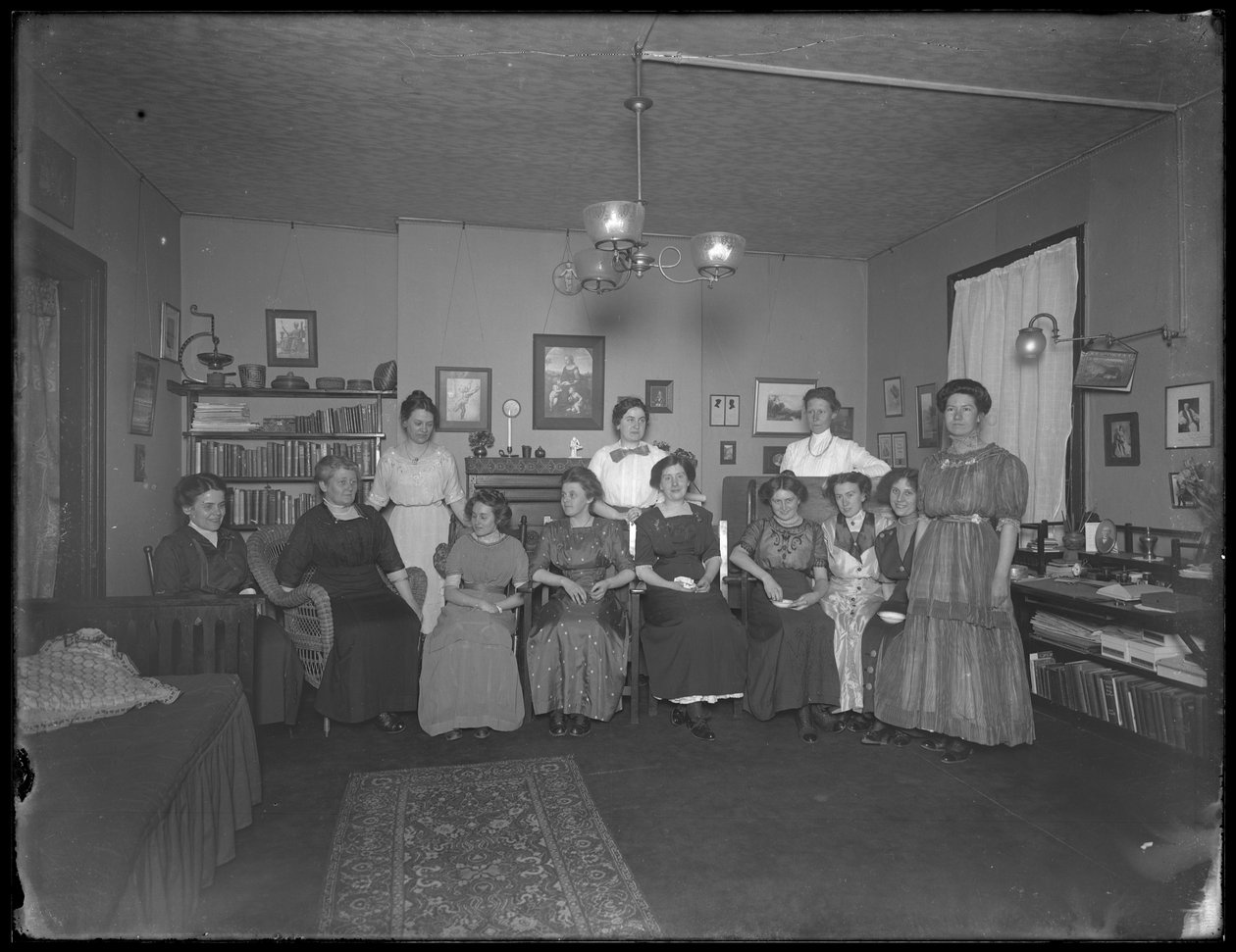 Harriet E. Hassler with a group of young women, 206 W. 13th Street by William Davis Hassler