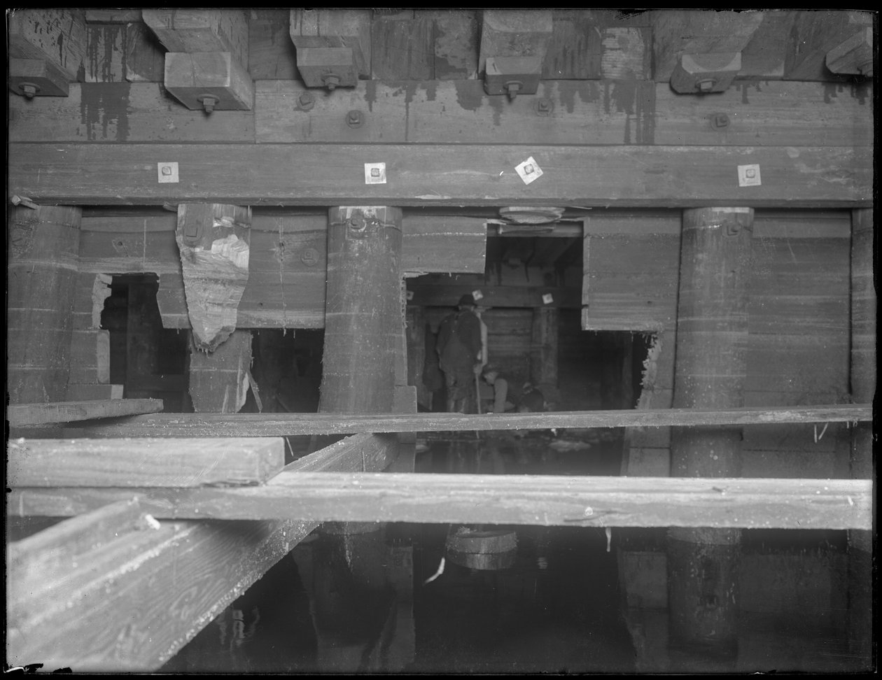 Men working in the W. 129th Street sewer, New York by William Davis Hassler