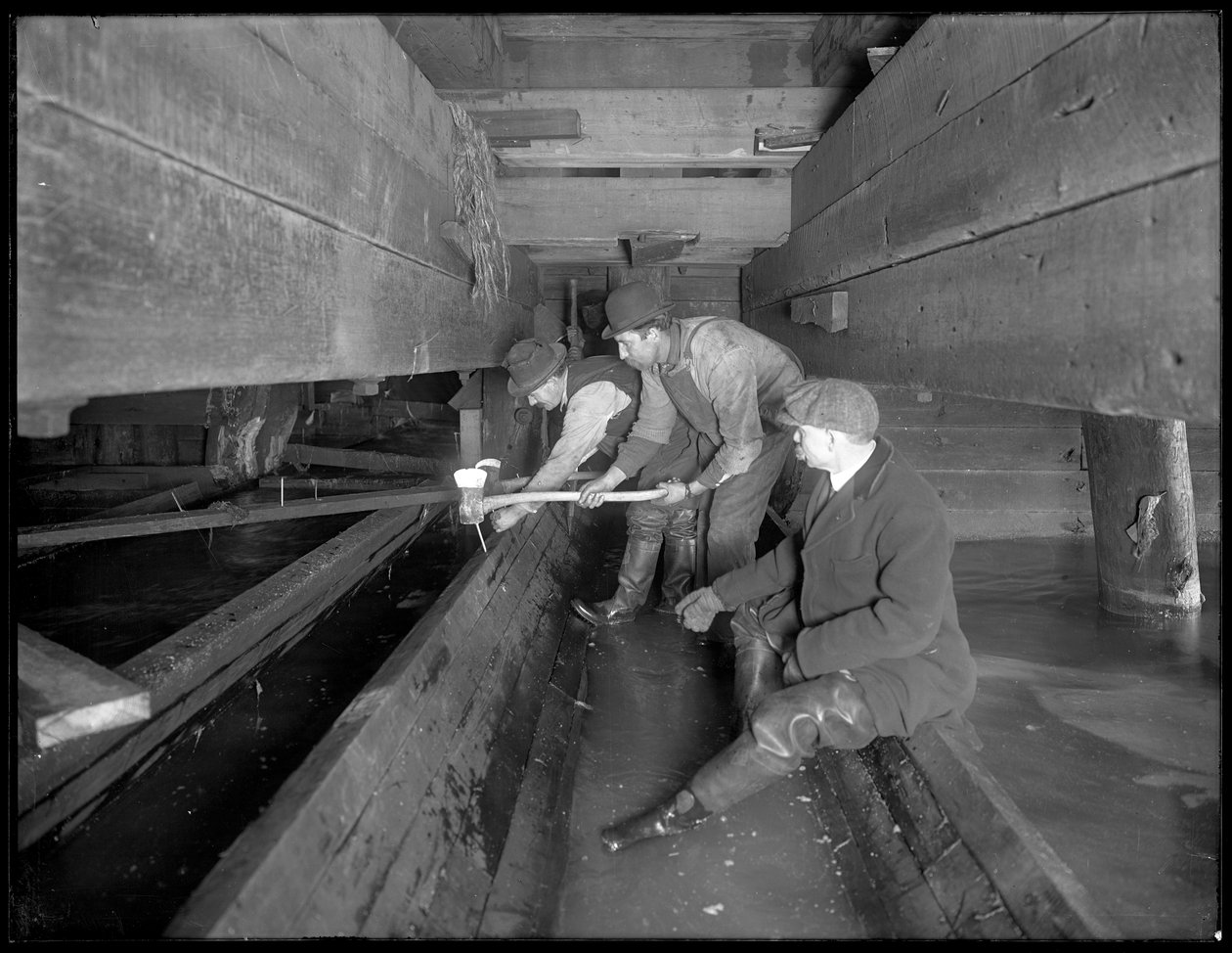 Men working in the W. 129th Street sewer, New York, c.1911 by William Davis Hassler