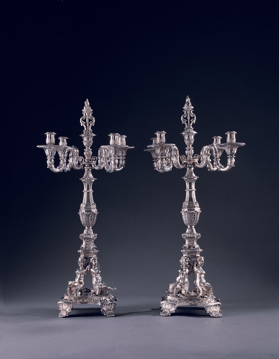 Pair of highly important German four-light candelabra, commissioned for George II, made by Balthasar Friedrich Behrens, Hanover, 1736-37 by William Kent