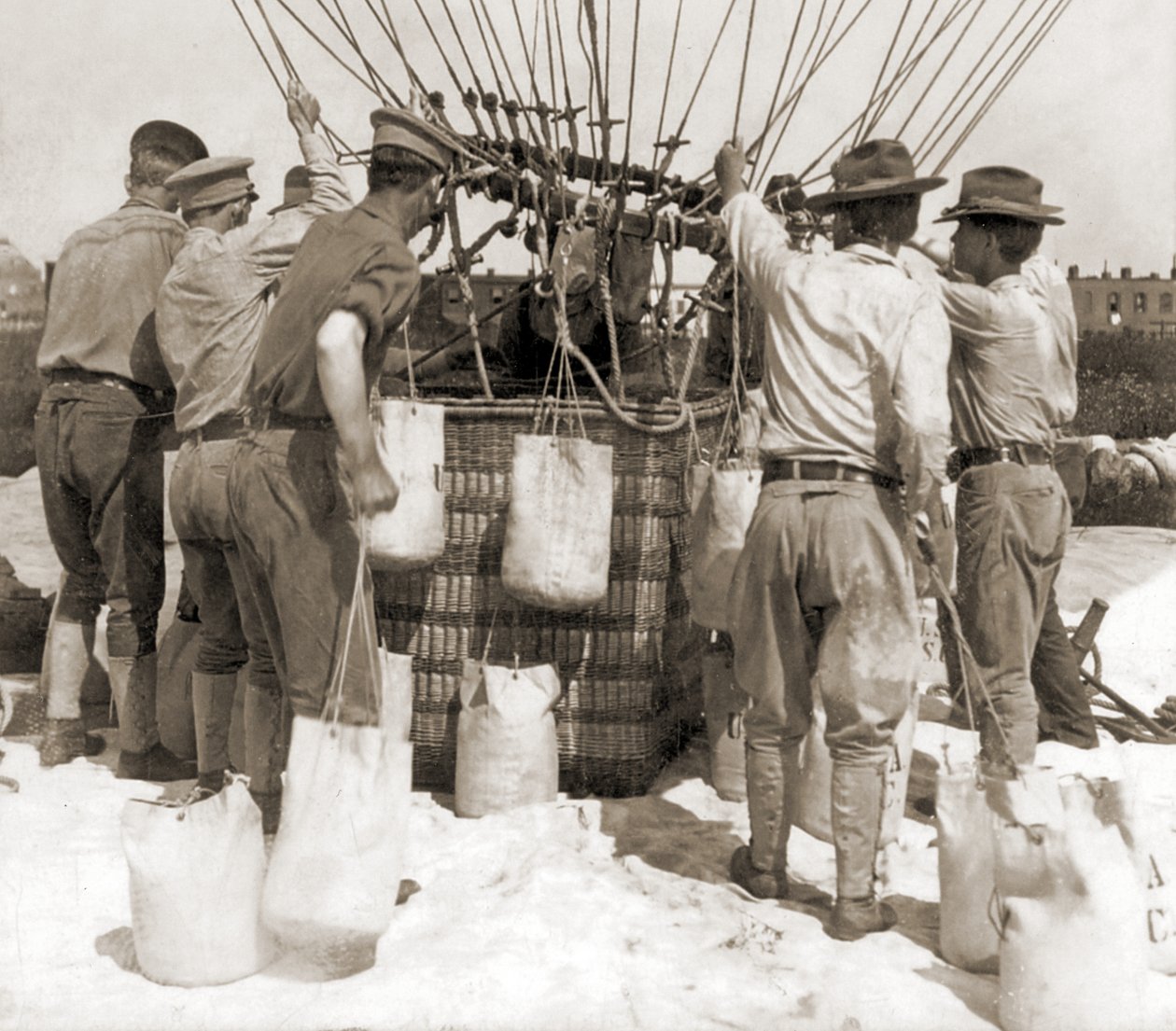Attaching Sandbags to the Basket of a Balloon, Fort Myer, USA by Hippolyte Lalaise Devéria
