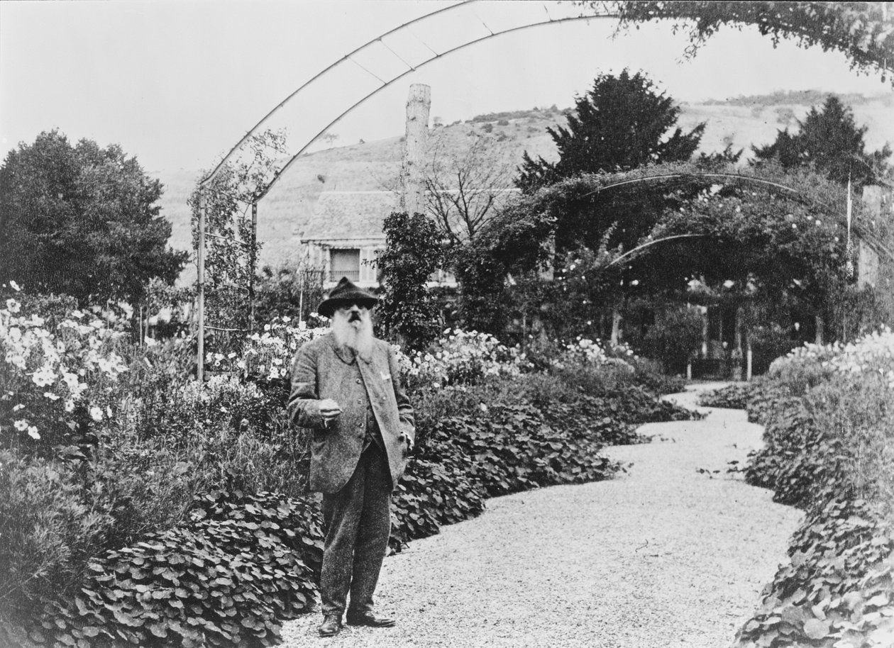Claude Monet in his garden at Giverny, 1925 by French Photographer
