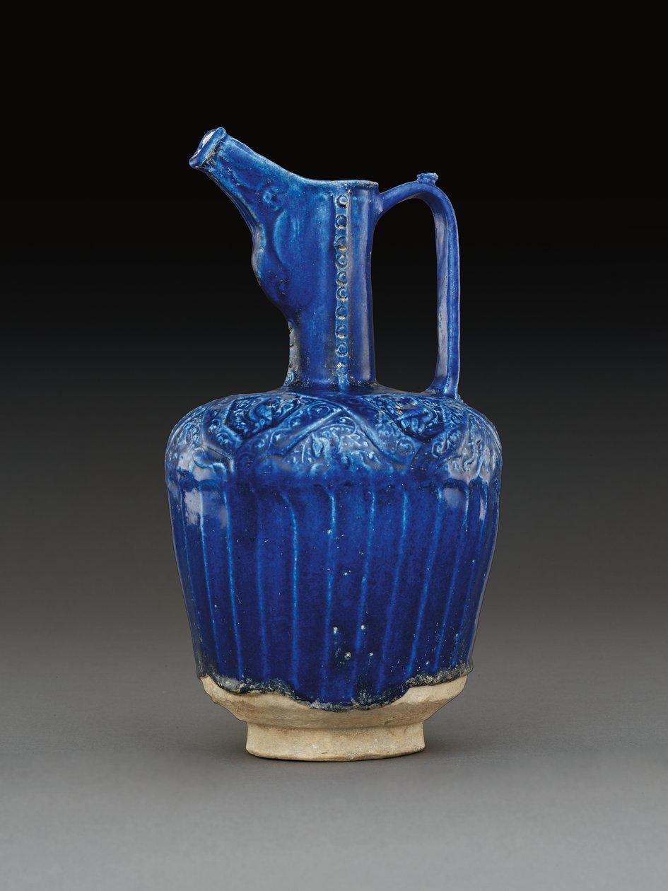 Nishapur moulded monochrome cobalt-blue glazed pottery ewer, Eastern Iran by School Iranian