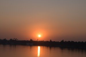 Golden Sunset Reflections on a Tranquil River