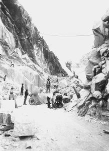 Excavators at work at a marble quarry in the Apuan Alps, Tuscany