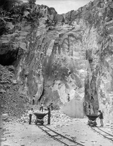 Excavators at work at a marble quarry in the Apuan Alps, in Tuscany (b/w photo) by A. Corsini