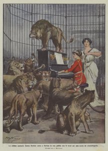 The Famous Singer Emma Destinn Sings in Berlin in a Cage with 14 Lions for a Cinematographic Scene