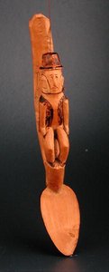 Figure of a European man seated on shaft of a spoon, South East Africa, late 19th century by African