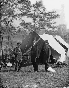 Abraham Lincoln with Allan Pinkerton and Major General John A. McClernand by Alexander Gardner