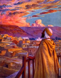 Muezzin calling the faithful to prayer at a village in the desert