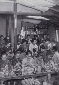 Girls decorating cheap pottery by American Photographer (after)