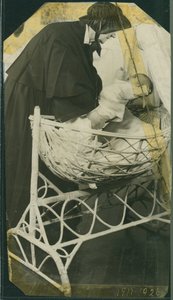 New York Foundling Hospital - Sister Anna Michella with baby and cradle by American Photographer