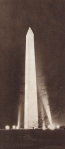 Obelisk Illuminated by Floodlights at Night