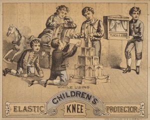 Children Kneeling on Floor Playing with Toys