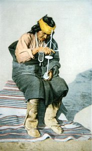 Pueblo man drilling turquoise, c.1905 by American School