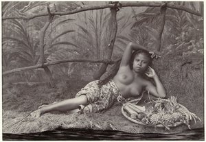 Portrait of an Unknown Half-Naked Indonesian Woman, Lying with a Fruit Basket in a Decor