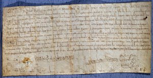 Charter of King Charlemagne (Charles I, Charles the Great or Carolus Magnus) (742-814) exempting the abbey of Saint Denis from tolling fees during the fair. End of the 8th century. Paris, National Archives