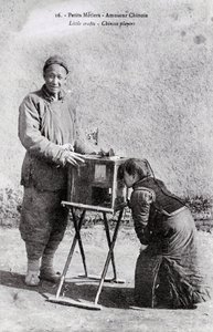 A Traveling Entertainer with an Image Box - Photograph of the Beginning of the 20th Century - Private Collection