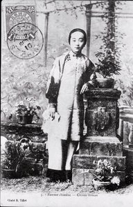 Portrait of a young Chinese woman in traditional costume. Photography from the beginning of the 20th century - Private collection by Anonymous Anonymous