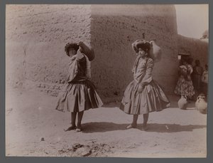 Two women carrying clay jugs by Antoin Sevruguin