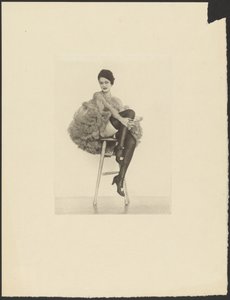 Woman in Can Can Costume Seated on Stool by Arthur F. Kales