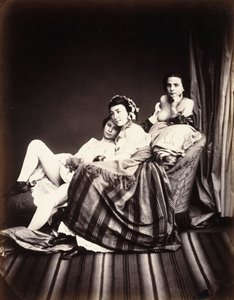 Three Nude Women on a Chaise Lounge