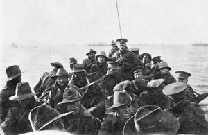 A View Looking Aft of Lifeboat Carrying Unidentified Men of the Australian 1st Divisional Signal Company, as They Are Towed Towards Anzac Cove at 6 am on the Day of the Landing, 25 April 1915 by Australian Photographer