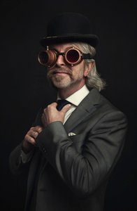 Gentleman in Steampunk Goggles by Baden Bowen