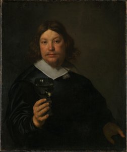 Man Holding a Glass of Wine