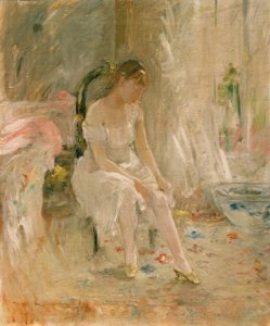 Woman Dressing or Young Girl Putting on Her Stocking