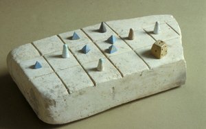 Game board with playing pieces, from Tell Beit Mirsim, Jordan, c.1200 BC
