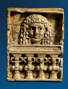 Plaque depicting a woman at a window