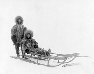 Couple on Dog Sled, Nome, Alaska by Brothers Lomen