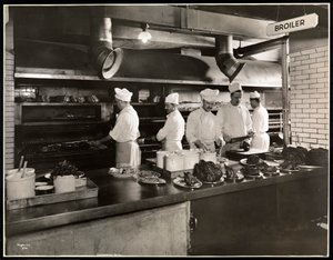 Cooks at the broiler in the kitchen of the Hotel Commodore, 1919