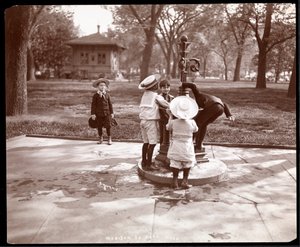 Five children playing and drinking at fountain in Madison Square, New York, 1901