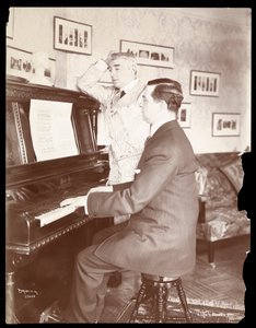 Kyrle Bellew and friend at the piano in Bellew