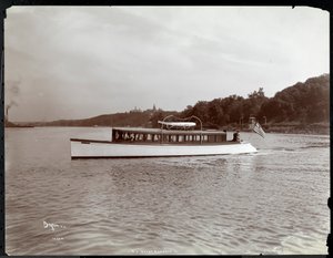 View of the Yacht Delicia of the New York Yacht, Launch and Engine Co. on the Hudson River near Morris Heights, New York, 1903 by Byron Company