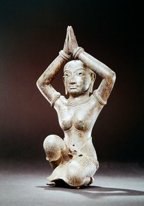 Kneeling female