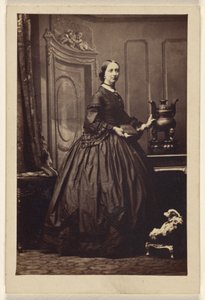 Unidentified woman holding a book, standing by Camille Silvy
