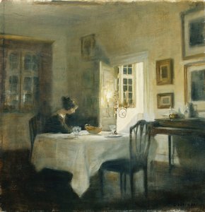 A Woman at a Table in a Dining Room