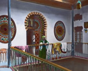 Moroccan woman in gallery, image date: circa 1910, Carl Simon Archive