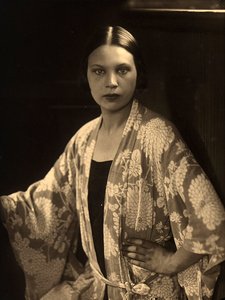Half-length portrait of Wanda Wulz wearing a kimono dressing gown by Carlo Wulz