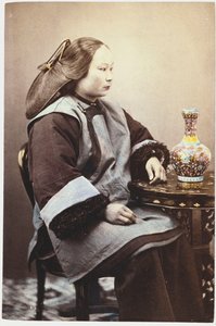 A Hand Tinted Photograph of a Young Chinese Woman by Chinese School