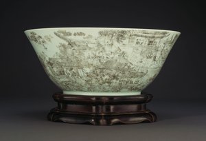 A large incised porcelain bowl depicting a continuous scene of ladies in the palace grounds by Chinese School