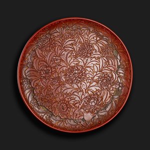 Carved dish bearing the mark of Xuande (1426-36) in the base, Chinese