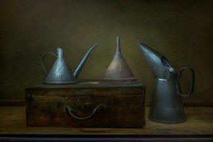 Aged Metal Pouring Tools