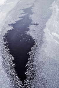 Dark Water Through Ice by Christina Sillen