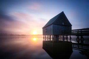 Misty Boathouse Sunrise