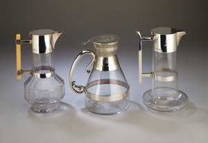 Silver mounted claret jug; electroplate mounted claret jug with aesthetic style decoration to mounts; silver mounted claret jug, all manufactured by Hukin & Heath